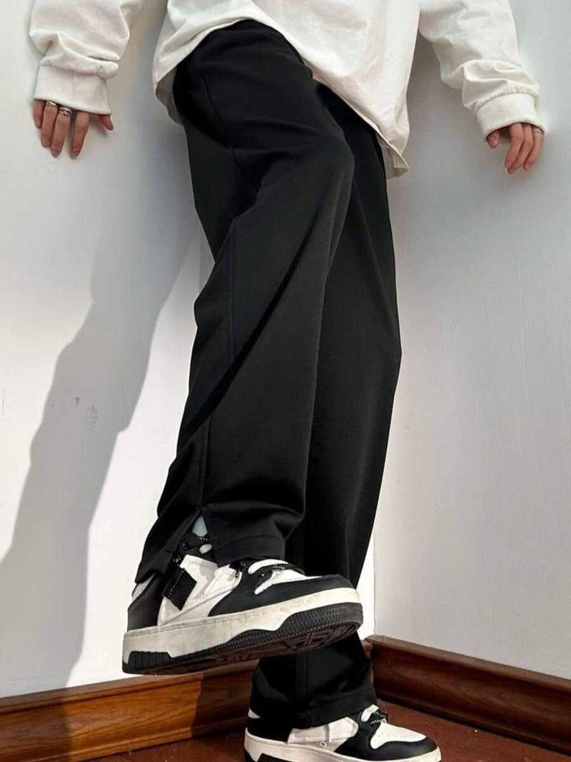 FLYNOFF Black Solid Loose Fit Men's Track Pant - Image 1